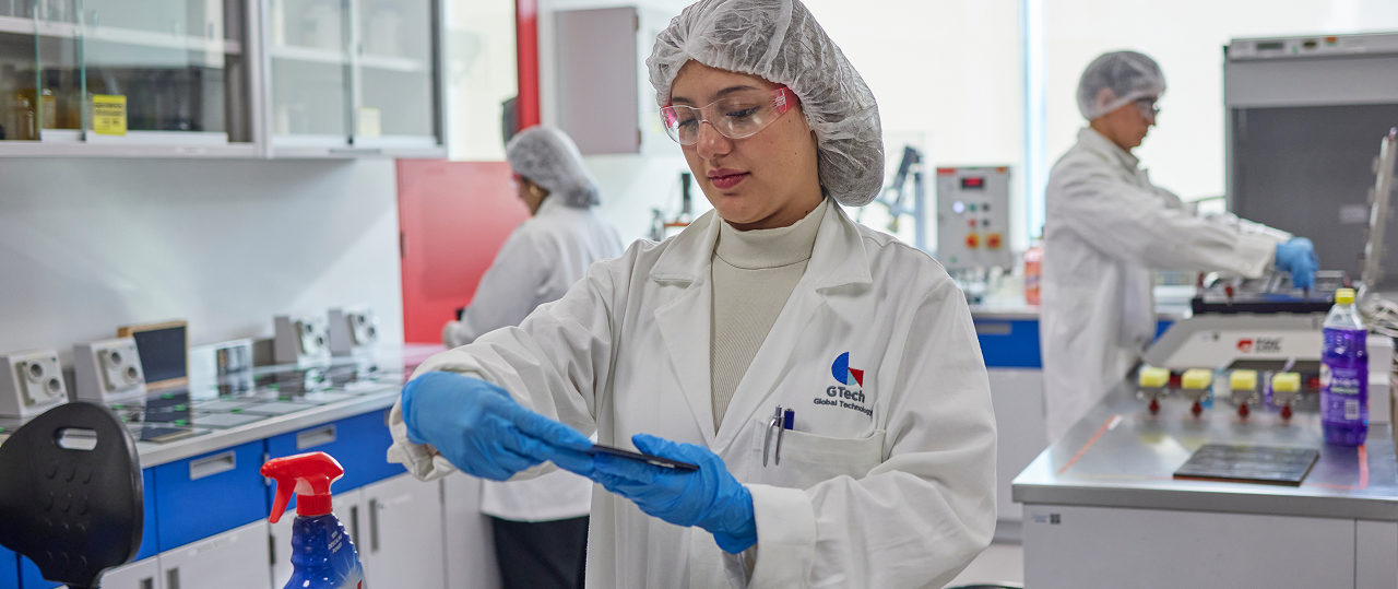 Group of scientists in a laboratory testing out innovative new products for consumers.